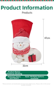 Detailed view of large knitted Christmas stocking with 3D snowman and 47cm size guide
