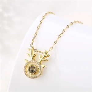 Golden reindeer necklace with zircon ring and 100 languages projection stone pendant
