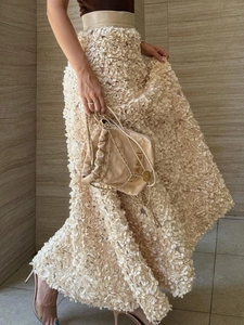 Elegant 2025 autumn maxi skirt with 3D petal texture and high waist for formal evening wear