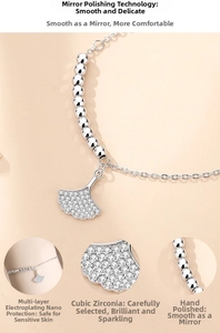 Macro detail of S925 silver ginkgo leaf bracelet with shimmering cubic zirconia stones