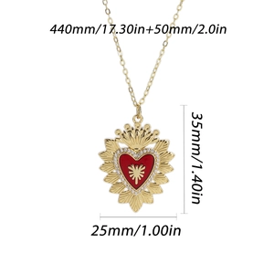 Close-up of gold heart pendant with red enamel sunburst and detailed size dimensions