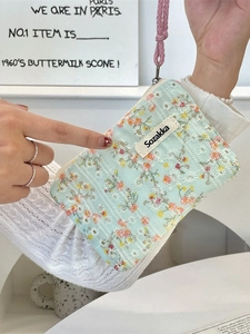 Floral canvas small makeup pouch in mint green with secure zipper and hand strap