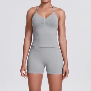 Detail of silver seamless yoga set with ruched sports bra and high-waisted shorts