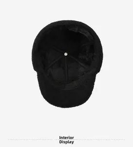 Lining display of thick fleece interior on a black winter hat for men