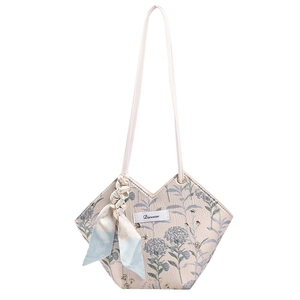 Floral canvas tote bag with V-shaped opening, silk scarf accessory and shoulder straps