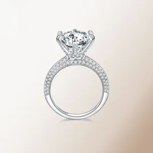 Detailed close-up of S925 sterling silver ring with crown setting and moissanite