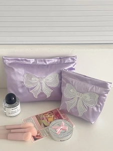 Purple satin cosmetic bag set with elegant bow embroidery and glossy silk finish