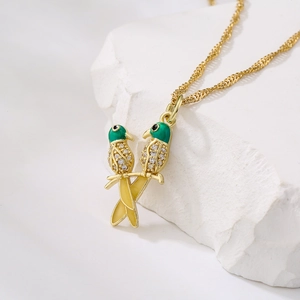 18K gold plated copper necklace with green parrot pendant and sparkling zircon stones