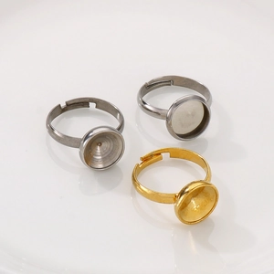 Three adjustable stainless steel DIY ring blanks in gold and silver with round flat base