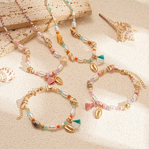 Bohemian beach style jewelry set with pearl, conch beads and colorful shell pendants
