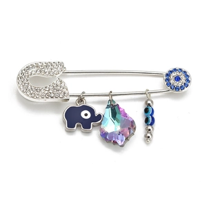 Detail of evil eye brooch pin featuring blue enamel elephant and crystal charms