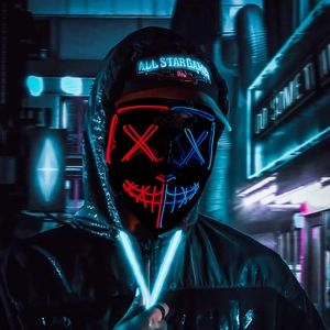 Close-up of red and blue LED Purge mask glowing in dark cyberpunk street setting