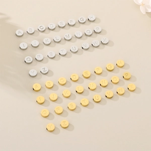 Flat round stainless steel alphabet beads in gold and silver finish for DIY jewelry