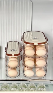 Detail of stackable egg storage bins in a fridge with PET clear plastic and vent lids