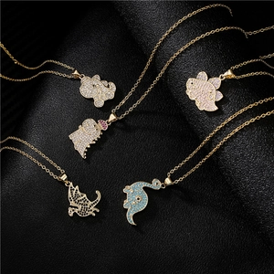 Hiphop gold plated animal pendants with micro paved zircons on textured background