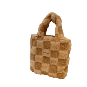 Fleece checkered waffle bucket handbag with lamb wool texture in khaki and beige tones