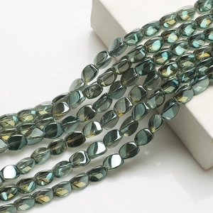 Detail of dark green translucent rectangle crystal beads for DIY jewelry and lighting