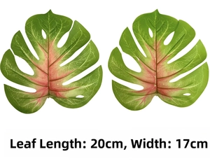 Detail view of faux monstera leaves with pink veins showing size 20cm by 17cm