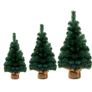 Three sizes of mini artificial green Christmas trees with rustic burlap wrapped bases