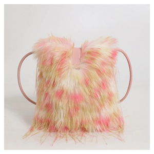 Detail shot of the pink and yellow gradient faux fur texture on the stylish shoulder bag
