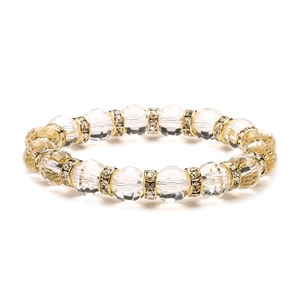 Detailed shot of sparkling multifaceted crystal beads with gold rhinestone spacers