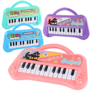 Juguetes de piano electrónico portátiles para niños en cuatro colores con mango