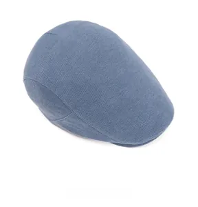 Detailed top-down view of the soft knitted texture on this navy blue cotton beret cap