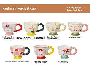 Detail view of colorful ceramic mugs with hand-painted patterns and twisted relief handles