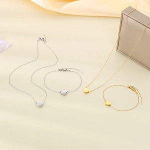 Parure de bijoux en acier inoxydable plaqué or 18k et argent avec pendentifs coeur et diamants