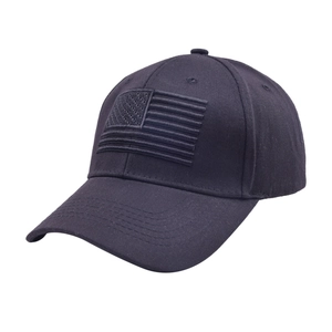Detail of navy blue cotton baseball cap with tonal embroidered US flag and stitching