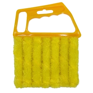 Detailed view of yellow microfiber blind cleaner brush with ergonomic handle for gaps