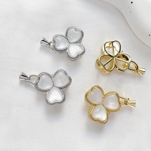 Gold and silver four-leaf clover charms with mother of pearl inlay for DIY jewelry