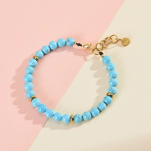 Adjustable 6mm turquoise beaded bracelet with gold stainless steel clasp and extender