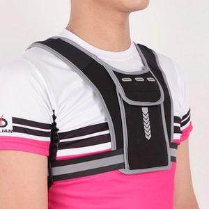 Close-up of black sports chest bag with grey reflective trim and front phone pocket