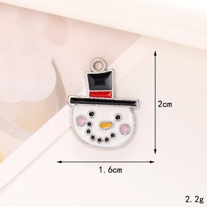 Detailed view of enamel snowman pendant with 2cm height and 1.6cm width dimensions