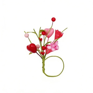 Pink and red heart napkin ring with artificial flowers for Valentine's wedding decor