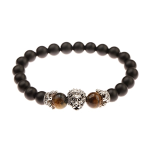 Detailed shot of matte black beads with a silver lion head and brown tiger eye stones