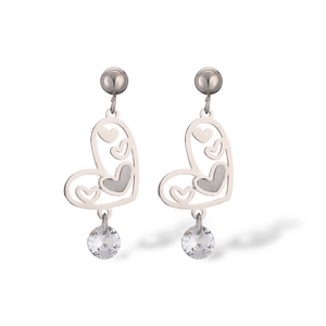 Detail of silver heart hoop earrings featuring a sparkling round crystal pendant