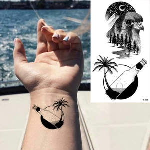 Minimalist temporary tattoo stickers with geometric eagle and landscape designs for wrist