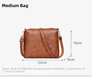 Brown vintage tote bag dimensions 23x18x8cm with adjustable shoulder strap detail