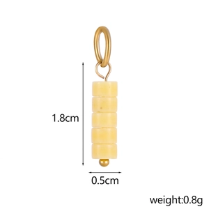 Close-up of minimalist DIY yellow bead pendant with dimensions 1.8cm by 0.5cm