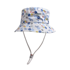 Detail of floral bucket hat with adjustable white windproof drawstring and blue flowers