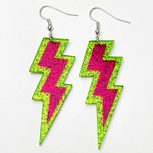 Pink and green sequin lightning bolt earrings with silver hooks shown in detail