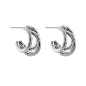 Macro detail of silver minimalist interlocking triple hoop earrings in polished finish