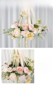 Detail of pink silk roses and dahlias with crystal beads and ribbons for party decor