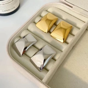 Chic 18k gold and silver stainless steel rectangular hoop earrings in a jewelry box