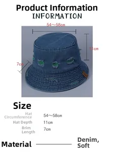 Detail view of blue distressed denim bucket hat with size chart and green frayed edges