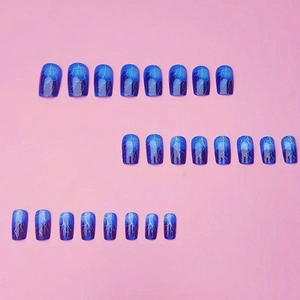 24pcs Blue gradient press-on nails with white lightning patterns in a medium square shape