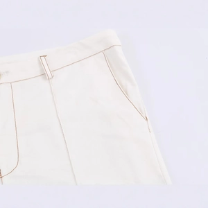 Fashionable high waist white flare pants with contrast stitching and cotton twill texture
