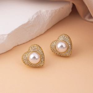 Elegant gold heart earrings with white pearls and sparkling cubic zirconia for women